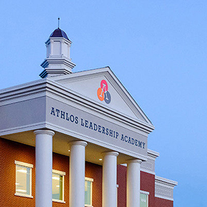 Athlos Academies assists three partner schools attain local ownership