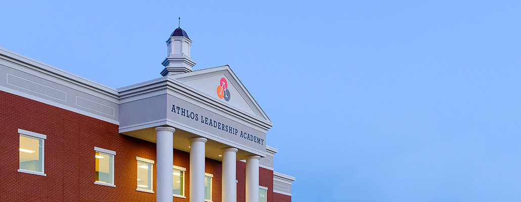 Athlos Leadership Academy at dusk