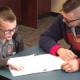 Students and parents at student-led conferences