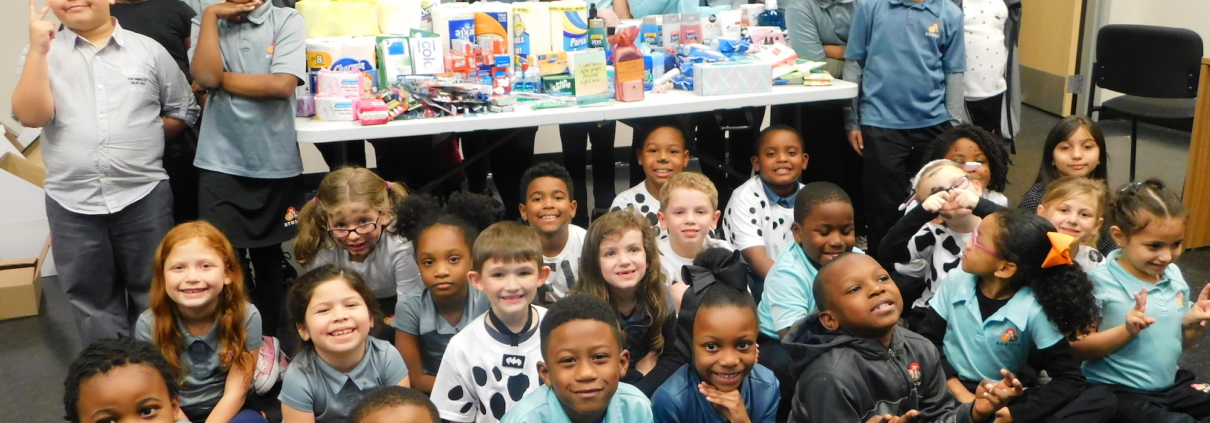 Athlos Students Donate to Military and Animal Shelter for MLK Day